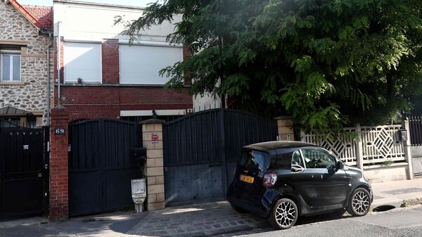 This photograph taken on July 22, 2026, shows the residence (R) of model agent Daniel Siad in Colombes, north-western suburb of Paris, where he was found dead on July 20.