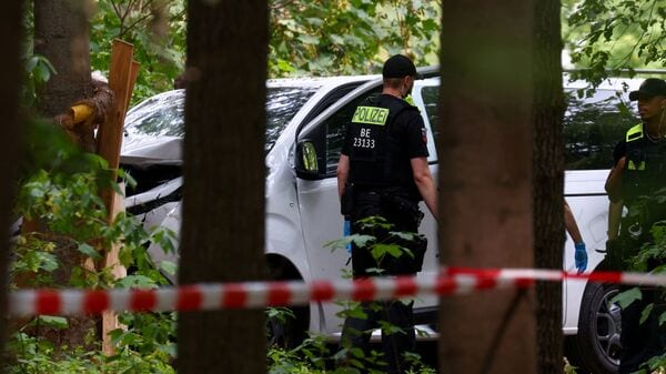 Police investigate the vehicle that crashed into a crowd near Berlin's annual Christopher Street Day Pride parade on Saturday evening, leaving multiple people injured and the parade called off, in Berlin, Germany, July 26, 2026. REUTERS/Christian Mang