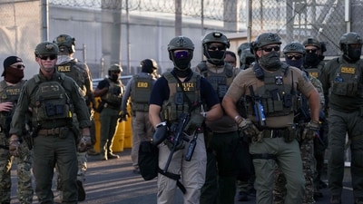 ICE agents guard outside of Delaney Hall Immigration Detention Center in Newark, New Jersey. (Getty Images via AFP)