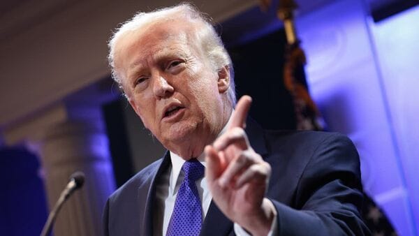 US President Donald Trump has maintained that military options remain on the table despite the operational pause. (Photo by Kevin Dietsch/Getty Images)