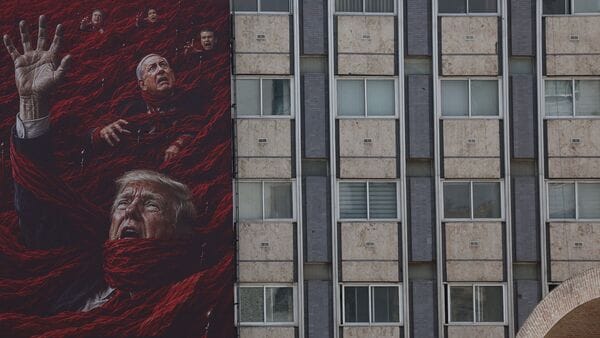 A billboard depicting U.S. President Donald Trump and Israeli Prime Minister Benjamin Netanyahu on a building in Tehran, Iran, July 21, 2026. Majid Asgaripour/WANA (West Asia News Agency) via REUTERS