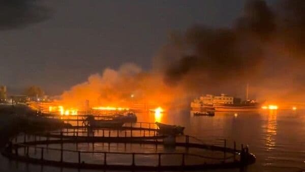 File image of smoke rising from a port, near the Strait of Hormuz, following a U.S. strike in Kuhestak, Hormozgan Province, Iran, July 8, 2026
