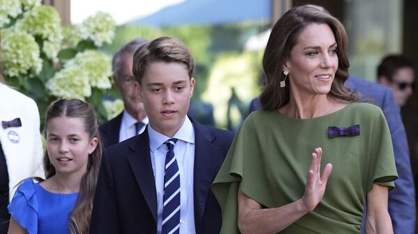 Britain's Kate, Princess of Wales, Prince George and Princess Charlotte arrive on day fourteen of the 2026 Wimbledon Championships at the All England Lawn Tennis and Croquet Club, London, England, Sunday, July 12, 2026. (Andrew Matthews/PA via AP, Pool)