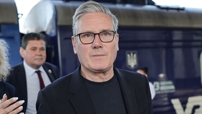Keir Starmer backed a FIFA investigation after Argentina players displayed a Falklands banner, triggering criticism from UK officials. (Photo by Stefan Rousseau / POOL / AFP) (AFP)
