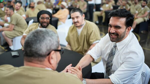 New York City Mayor Zohran Mamdani speaks with inmates on Rikers Island as they watch the World Cup semifinal soccer match between England and Argentina on Wednesday, July 15, 2026, in New York. (AP Photo/Seth Wenig)