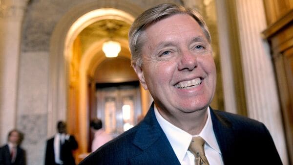 FILE - Sen. Lindsey Graham, R-S.C., speak with reporters following a vote on student loans on Capitol Hill in Washington, May 8, 2012. (AP Photo/Susan Walsh, File)