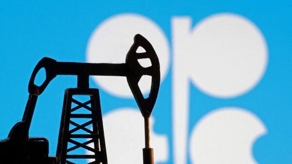 A model of an oil pump is seen in front of the OPEC logo in this illustration taken January 9, 2026