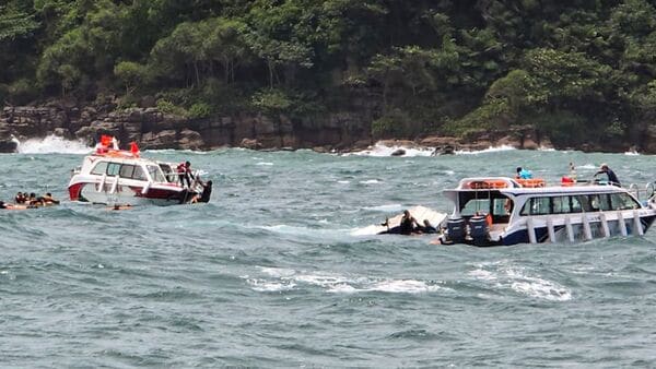 Rescue personnel carry out operations after a speedboat carrying Indian tourists capsized near Hon May Rut Ngoai off Phu Quoc Island, Vietnam, on Saturday. Fifteen Indian tourists were killed and 16 others rescued in the accident.