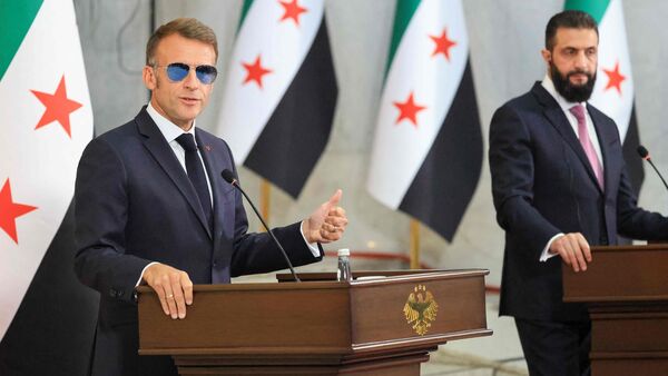 French President Emmanuel Macron with Syrian President Ahmed al-Sharaa in a joint press conference in Damascus on 7 July during Syria visit.