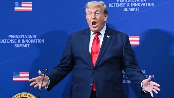US President Donald Trump gestures as he arrives to speak at the Pennsylvania Defense and Innovation Summit at the US Army War College in Carlisle, Pennsylvania.