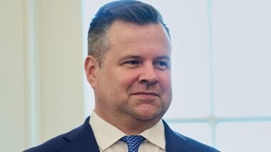 Bill Pulte, acting director of national intelligence, listens as President Donald Trump speaks in the Oval Office of the White House during an executive order signing about quantum computing, Monday, June 22, 2026, in Washington. (AP Photo/Jacquelyn Martin)
