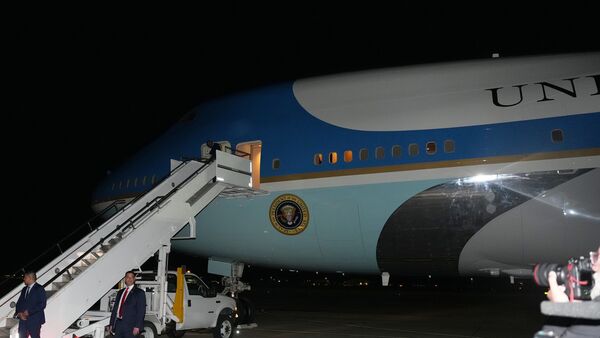 Air Force One sits on the tarmac as President Donald Trump switches planes at U.S. Air Force Base, RAF Mildenhall in Suffolk Eastern England, on his way back to Washington from the NATO summit in Ankara, Turkey.
