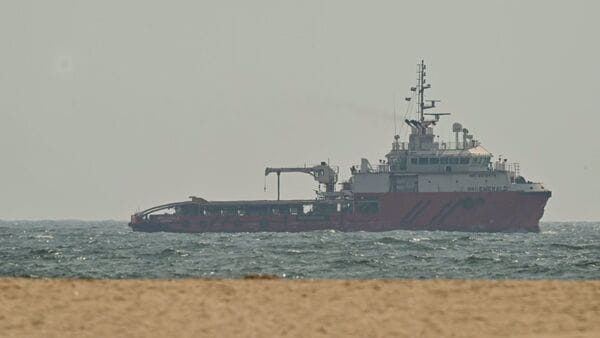 A ship sails off the coast of Ajman on July 10, 2026. (Photo by AFP) /