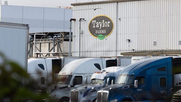 A Taylor Farms sign is displayed at one of their facilities on July 17, 2026 in Salinas, California. Taylor Farms, a global fresh produce supplier, is allegedly connected to the recent cyclosporiasis outbreak.