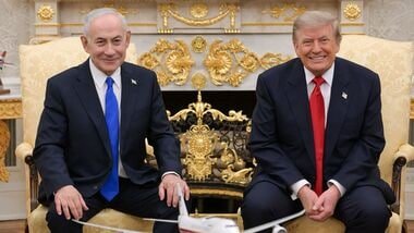 This handout picture released by the Israeli Government Press Office (GPO) Shows Israel's Prime Minister Benjamin Netanyahu (L) posing for a picture with US President Donald Trump in the Oval Office of the White House in Washington DC, ahead of their meeting on July 28, 2026. (Photo by GPO / AFP)
