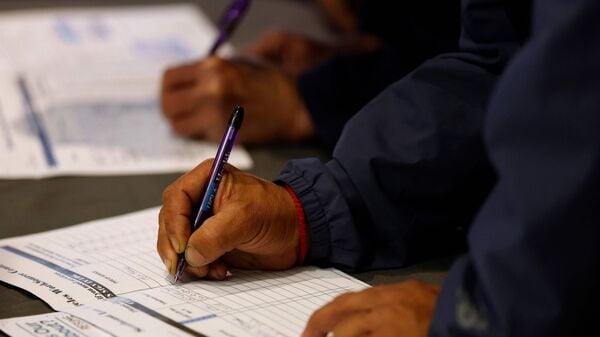 Number of Americans filing for unemployment benefits dipped slightly last week as layoffs remained historically low. Applications for US jobless aid ticked down to 2,15,000, the Labor Department reported Thursday.
