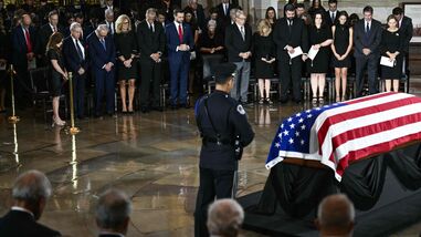 Attendees bow their heads during a Congressional tribute to late US Senator Lindsey Graham in the Rotunda of the US Capitol in Washington, DC, on July 28, 2026. (Photo by Brendan SMIALOWSKI / AFP)