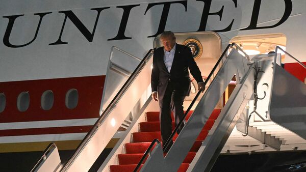US President Donald Trump disembarks from Air Force One upon arrival at Joint Base Andrews, Maryland on July 9, 2026. Trump is returning from the NATO Summit in Turkey. (Photo by SAUL LOEB / AFP)
