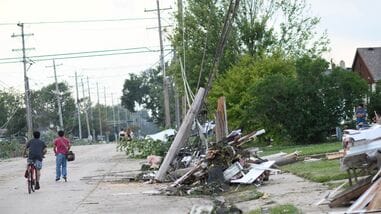 Debris litters the street after a tornado ripped through parts of Wisconsin in Menasha, Wisconsin, on July 27, 2026.