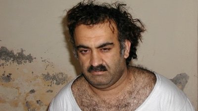 FILE- Khalid Sheikh Mohammed, the alleged Sept. 11 mastermind, is seen shortly after his capture during a raid in Pakistan Saturday March 1, 2003. (ASSOCIATED PRESS)