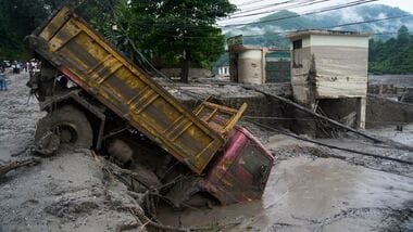 A vehicle is seen in the aftermath of a flash floods in Devighat in the Nuwakot district in Nepal
