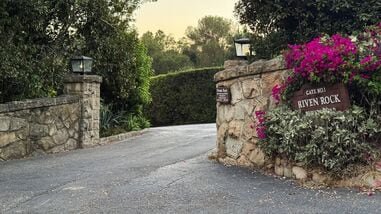 A general view of the entryway to a private road leading to Britain's Prince Harry's and his wife, Duchess of Sussex Meghan's home in Montecito, California, U.S., August 19, 2026. Picture taken with a mobile phone. REUTERS/Jane Ross