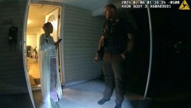 FILE - In this image from body camera video released by Illinois State Police, Sonya Massey, left, talks with Sangamon County Sheriff's Deputy Sean Grayson outside her home in Springfield, Ill., July 6, 2024.