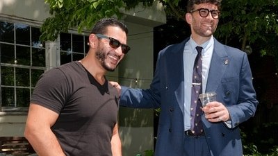 Abdul El-Sayed, candidate in the Democratic primary for US Senate in Michigan, talks poolside with streamer Hasan Piker at a party for content creators supporting his campaign, Monday, Aug. 3, 2026, in Detroit. (AP Photo/Julia Demaree Nikhinson)