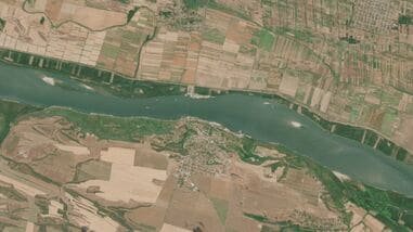 A satellite image shows water levels along the sandbanks of the Danube River at the Bulgarian-Romanian border, near Oryahovo, Bulgaria, on 5 August 2025. (European Union/Copernicus Sentinel-2/handout via Reuters)