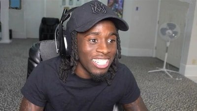 A viral video claims to show Kai Cenat arrested in Arkansas, but the footage actually shows Tedrick Washington during police arrest. (Kai Cenat/Twitch)
