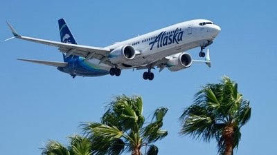 An Alaska Airlines flight that departed Miami International Airport for Seattle was forced to return to the gate on Sunday evening after crew members reported threats from passengers. (Mario Tama/Getty Images/AFP )