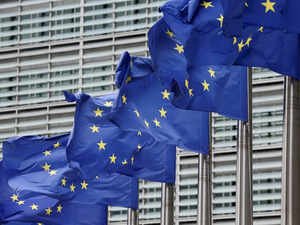 FILE PHOTO: European Union flags flutter outside the EU Commission headquarters in Brussels