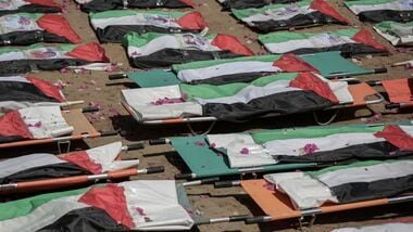 The mass burial of members of the Abu Sharia and al-Hasayna families whose bodies were recently found beneath buildings, after Israeli bombardments in the Sabra district in 2023, in Gaza City, Gaza, on Tuesday, Aug. 4, 2026. Photographer: Ahmad Salem/Bloomberg