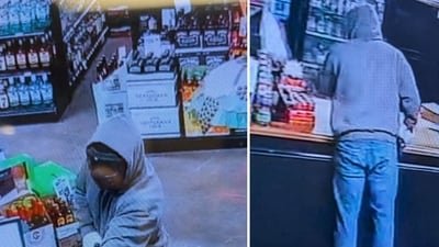 The masked suspect was seen on CCTV wearing a grey hoodie, jeans and black work-style boots (City of Jackson, TN - Police Department/Facebook)