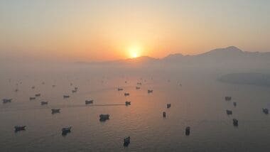 Latest news on August 19, 2026: FILE PHOTO: A drone view shows vessels in the Strait of Hormuz, as seen from Musandam, Oman, June 15, 2026.