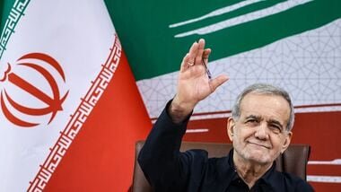 A handout photo made available by the Iranian Presidential Office shows Iran's President Masoud Pezeshkian attending a press conference in the capital Tehran, on August 8, 2026.