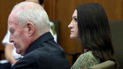 Defense attorney Kevin Reddington, left, and his client, Lindsay Clancy, listen to testimony during Clancy's murder trial at Plymouth Superior Court in Plymouth, Massachusetts. (AP Pool Photo)