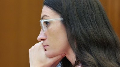 Defendant Lindsay Clancy listens to Dr. Jennifer Tufts on the witness stand during her murder trial at Plymouth Superior Court in Plymouth, Mass., Monday, Aug. 10, 2026. (Greg Derr/The Patriot Ledger via AP, Pool) (Greg Derr/Pool The Patriot Ledge)