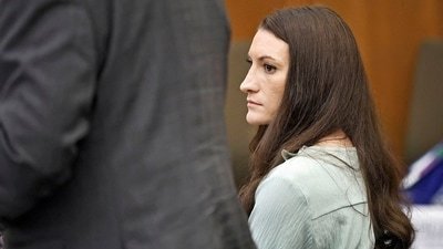 Lindsay Clancy watches the jury enter the room during her trial in Plymouth Superior Court, Plymouth, Massachusetts, U.S., August 17, 2026. Clancy is charged with murdering her three young children, Cora, Dawson and Callan, in their Duxbury home in 2023. Greg Derr/Pool via REUTERS REFILE - CORRECTING YEAR "2013" TO "2023". (via REUTERS)