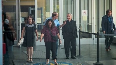 Michael and Paula Musgrove, the parents of Lindsay Clancy, who is accused of killing her children, leave the Plymouth Superior courthouse in Plymouth, Massachusetts, U.S., July 27, 2026.  Picture taken through a window. REUTERS/Brian Snyder (REUTERS)