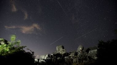 Meteors streak across the sky during the Perseid meteor shower above the ruins of Daorson, the ancient Illyrian city dating from 300 BC to 50 BC, in Stolac, Bosnia and Herzegovina, August 12, 2026. REUTERS/Amel Emric     TPX IMAGES OF THE DAY
