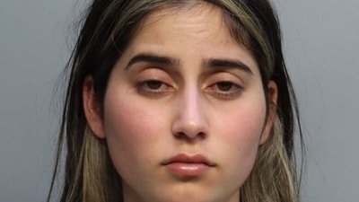Meliza Campos-Sanchez posted videos of setting a fire in her kitchen and pouring wax on her children. (miamidade.gov)