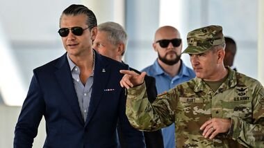 U.S. Defense Secretary Pete Hegseth (L) arrives for the closing ceremony of the multinational Panamax 2026 military exercises in Panama City, on August 13, 2026. (Photo by MARTIN BERNETTI / AFP)