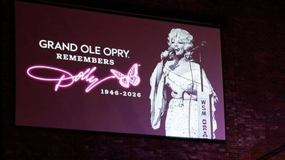 People attend a tribute to the late Dolly Parton at the legendary country music venue the Grand Ole Opry in Nashville, Tennessee, U.S., August 29, 2026. REUTERS/Seth Herald (REUTERS)