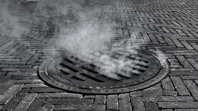 Three people were caught on video climbing out of a Manhattan manhole near Penn Station. (Unsplash)