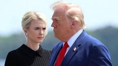 Natalie Harp, executive assistant to U.S. President Donald Trump, stands as President Trump arrives for a dignified transfer at Dover Air Force Base for military casualties of the war with Iran on July 22, 2026 in Dover, Delaware. Kevin Dietsch/Getty Images/AFP