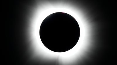 The internet buzzes over a theory predicting Earth's gravity loss on August 12, 2026, lasting seven seconds, linked to black hole collisions. NASA refutes the claim, explaining gravity's reliance on mass and emphasizing that gravitational waves are undetectable at significant levels. (AP Photo/Julio Cortez)