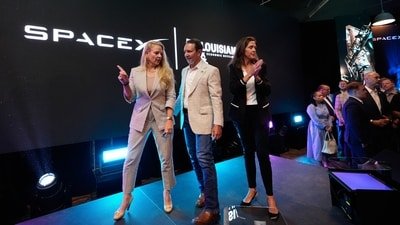 SpaceX President and COO Gwynne Shotwell speaks with Louisiana Gov. Jeff Landry and Secretary of Louisiana Economic Development Susan Bonnett Bourgeois. (AP Photo/Gerald Herbert)