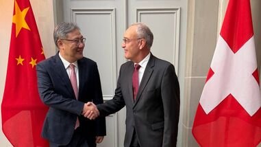 Switzerland's President Guy Parmelin with China's Minister of Commerce Wang Wentao