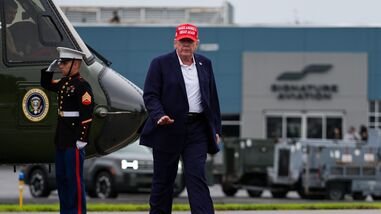 President Donald Trump walks to board Air Force One at Morristown Airport, Sunday, Aug. 16, 2026, in Morristown, N.J.